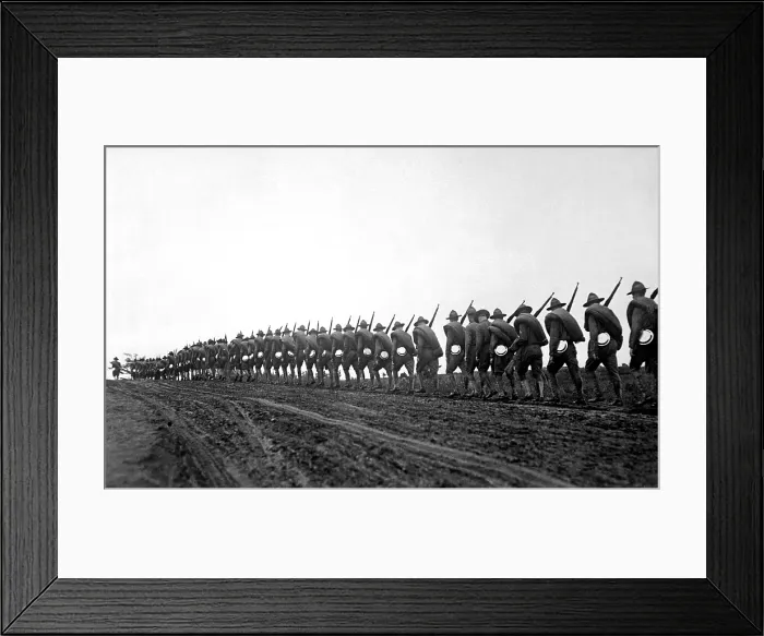 Framed Print : New York National Guard, silhouetted against the sky as they march to the training camp. World War I. Sept. 5, 1917