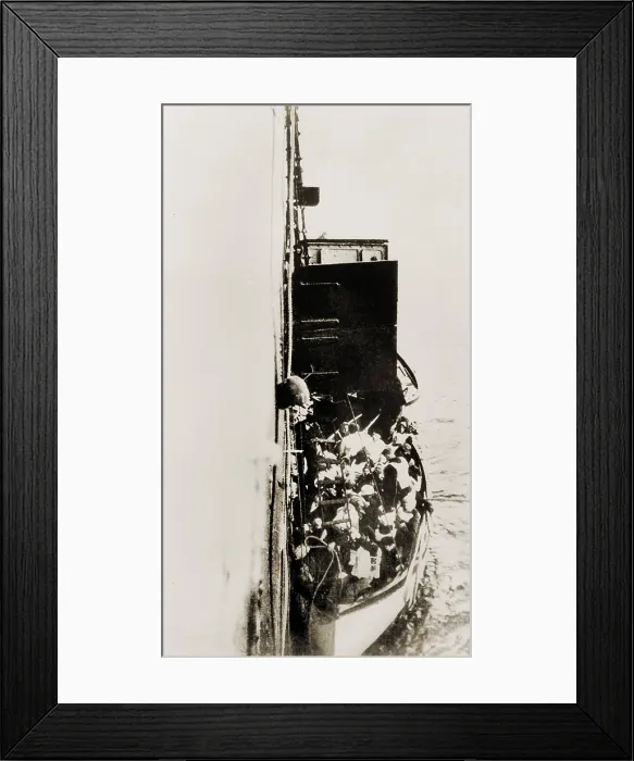 Framed Print : Lifeboat from Titanic is lifted aboard the rescue vessel Carpathia. April 15, 1912