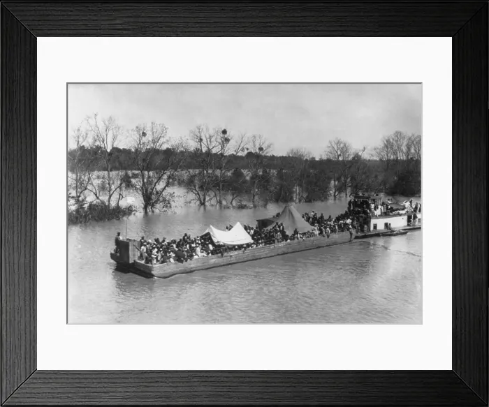 Framed Print : Barge loaded with poor African American refugees on the Sunflower River in Mississippi during the 1927 Flood