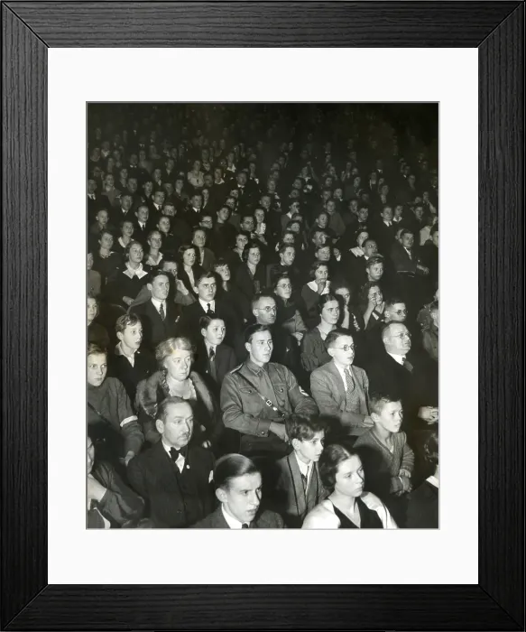 Framed Print : Germans attend the theater to view Nazi propaganda plays. The state managed theater was lead by Herr Herbert Maisch, a noted film director. Ca. 1937. (BSLOC_2013_11_30)