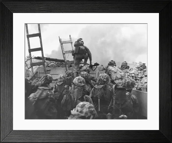 Framed Print : Marine Lt. Baldomero Lopez scaling a seawall after landing on Red Beach in the invasion of Inchon