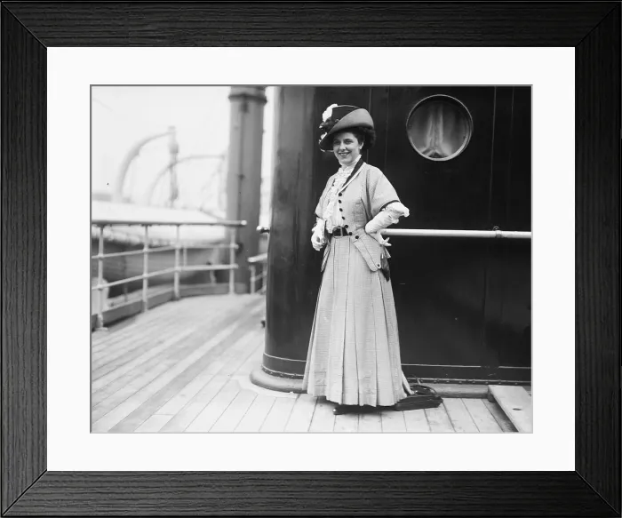 Framed Print : Geraldine Farrar (1882-1967), poses for a news photographer aboard an Ocean Liner in New York. Ca. 1910