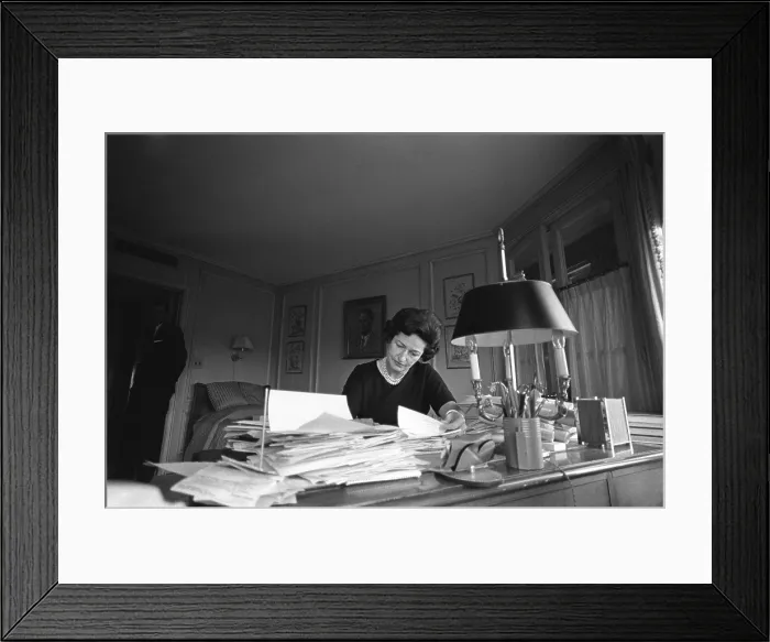 Framed Print : First Lady, Lady Bird Johnson, working in her study at The Elms, the LBJ vice presidential residence. She works in her new role a week after the Kennedy Assassination. Nov