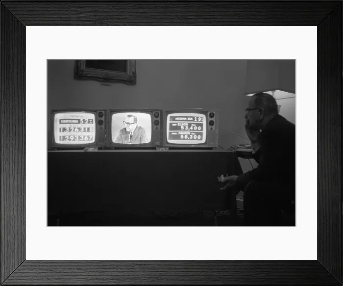 Framed Print : 1964 Presidential Election. President Lyndon Johnson watches election returns on three television sets in his suite at the Driskill Hotel, Austin, Texas. Nov. 3, 1964