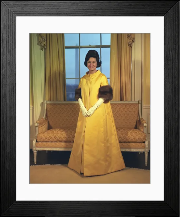 Framed Print : Lady Bird Johnson's Inaugural Gown. The First Lady wore canary-yellow fur trimmed ensemble by John Moore. She ordered the evening gown through Neiman Marcus in Texas. Jan Framed Print : Lady Bird Johnson's Inaugural Gown. The First Lady wore canary-yellow fur trimmed ensemble by John Moore. She ordered the evening gown through Neiman Marcus in Texas. Jan