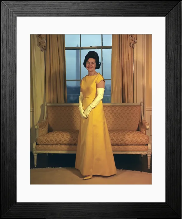 Framed Print : Lady Bird Johnson's Inaugural Gown. The First Lady wore canary-yellow bateau-neck gown by John Moore. She ordered her dress through Neiman Marcus in Texas. Jan. 1965