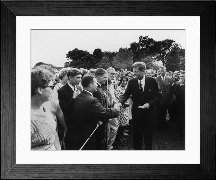 Framed Print : President John Kennedy meets with one of the first groups of Peace Corps volunteers. White House lawn, Aug. 11, 1961