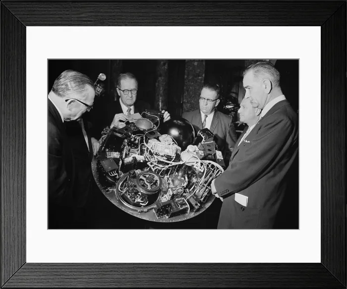 Framed Print : Senate Majority Leader Lyndon Johnson is shown the complex satellite circuitry of TIROS I, by NASA's William Stroud