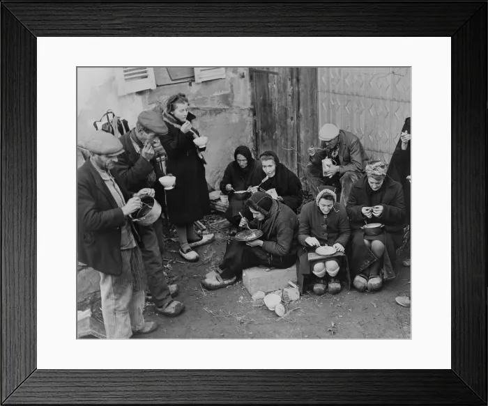 Framed Print : French refugees of the town of the Corcieux, France, eat their noon meal Framed Print : French refugees of the town of the Corcieux, France, eat their noon meal