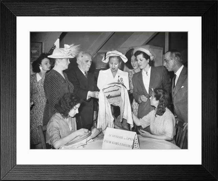Framed Print : Eva Peron visiting a sewing workshop where women workers were engaged in embroidery. July 1947. - (BSLOC_2014_17_69)