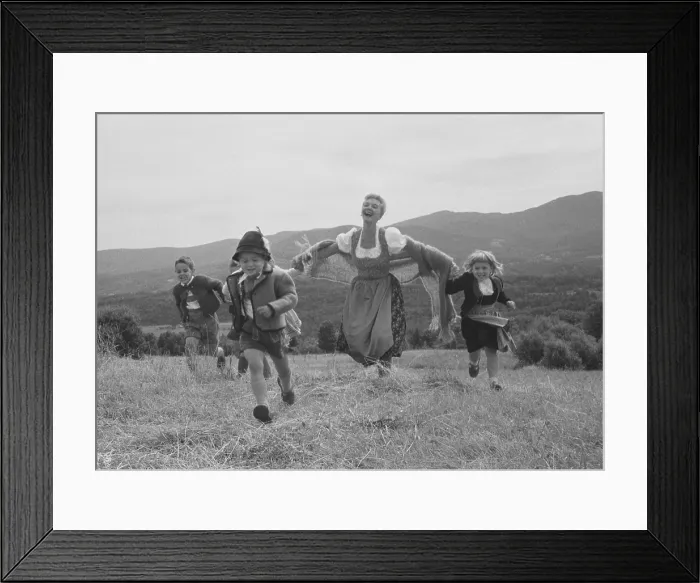 Framed Print : Mary Martin with children in mountain landscape. Martin played the leading role, Maria, in the Broadway musical The Sound of Music'. 1959 photo by Toni Frissell