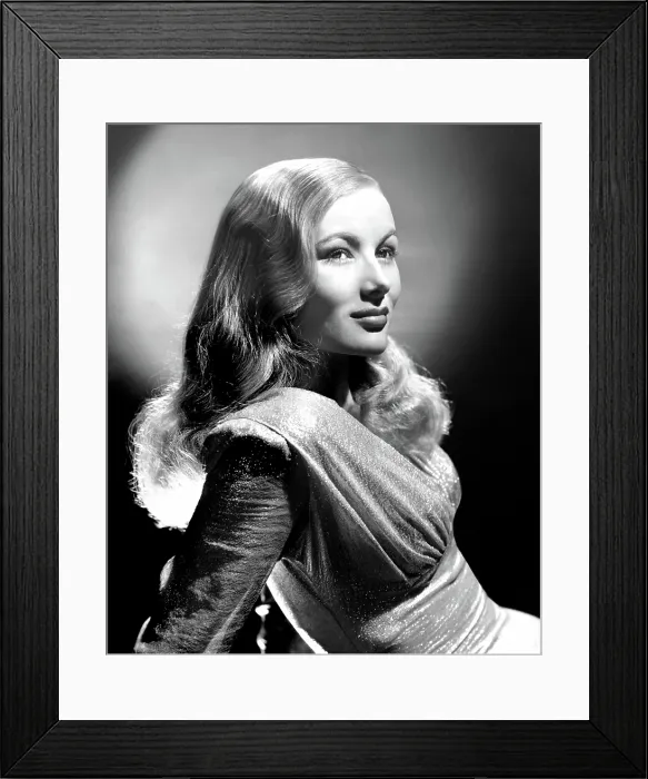 Framed Print : THIS GUN FOR HIRE, Veronica Lake, in a gown by Edith Head, 1942