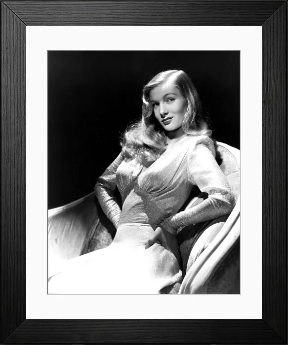 Framed Print : THIS GUN FOR HIRE, Veronica Lake, in a gown by Edith Head, 1942