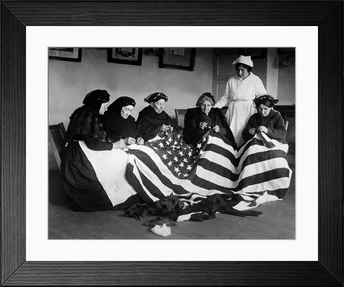 Framed Print : Patriotic elderly immigrant women making a flag during World War I. They are from Eastern Europe countries of Hungary, Galicia, Russia, Germany, and Rumania