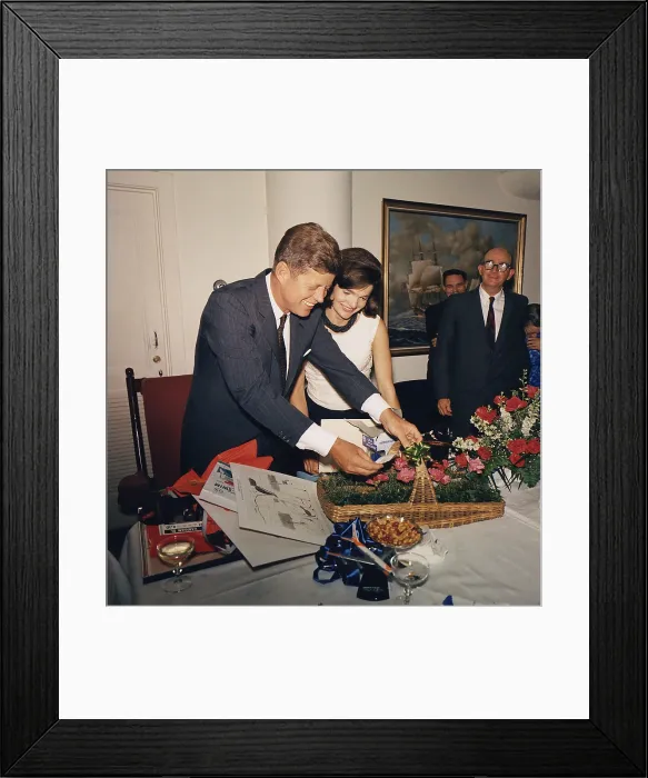 Framed Print : President's Birthday Party, given by White House Staff. L-R: President Kennedy, Mrs. Kennedy, Dave Powers. May 28, 1963 Framed Print : President's Birthday Party, given by White House Staff. L-R: President Kennedy, Mrs. Kennedy, Dave Powers. May 28, 1963