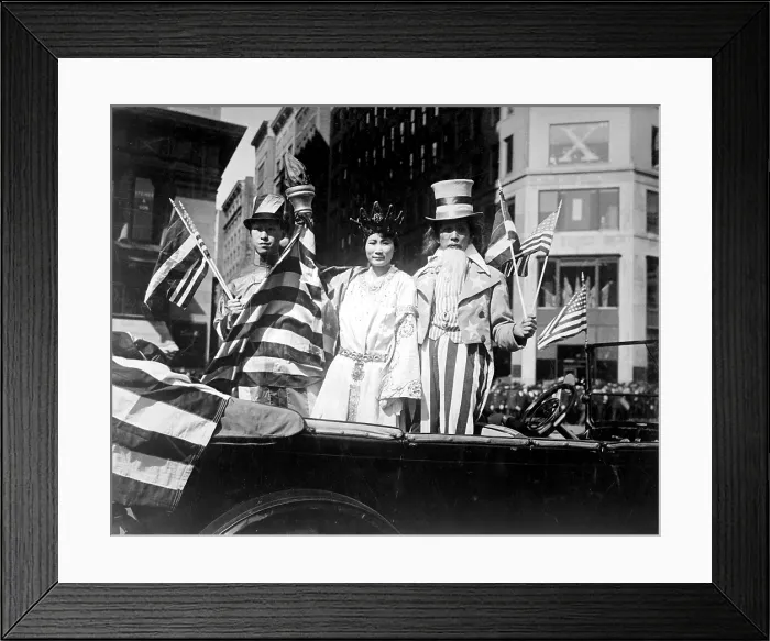 Framed Print : Chinese Americans in the Fourth Liberty Loan Campaign parade. They are costumed as China, Lady Liberty, and Uncle Sam during World War I. New York City. Oct. 1, 1918