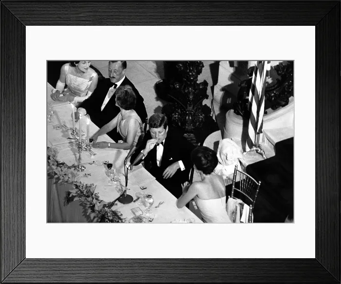 Framed Print : Jacqueline Kennedy leans over to talk with President Kennedy at the America's Cup Dinner Framed Print : Jacqueline Kennedy leans over to talk with President Kennedy at the America's Cup Dinner