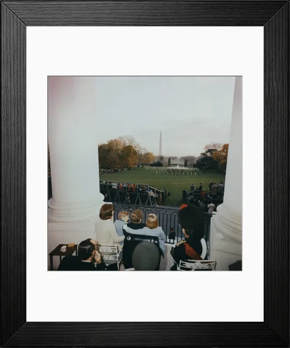 Framed Print : President Kennedy and his family watch the Black Watch Tattoo perform from the South Balcony of the White House