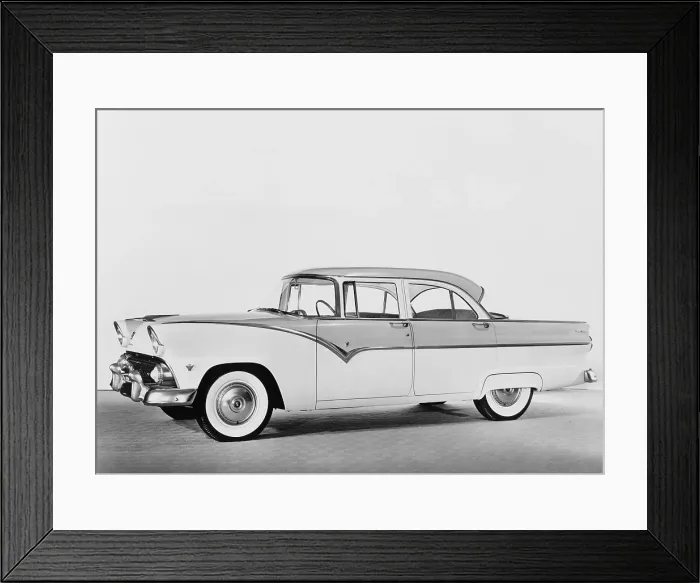 Framed Print : 1955 Ford four-door sedan featured two-tone paint, heavy chrome detail, white wall tires, wrap around windshield, and a hint of tail fins Framed Print : 1955 Ford four-door sedan featured two-tone paint, heavy chrome detail, white wall tires, wrap around windshield, and a hint of tail fins