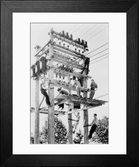 Framed Print : Young men working on telephone poles in Maine. National Youth Administration provided vocational training under the New Deal. 1939
