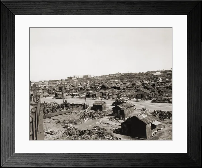 Framed Print : Tokyo's shanty town, where post-World War II homeless Japanese have set up housekeeping in small huts amid the ruins from wartime bombing. September 26, 1945 Framed Print : Tokyo's shanty town, where post-World War II homeless Japanese have set up housekeeping in small huts amid the ruins from wartime bombing. September 26, 1945