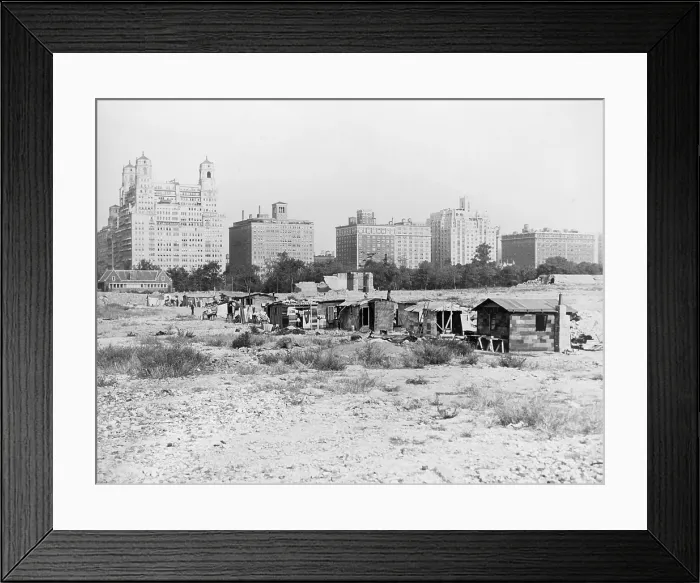 Framed Print : Squatter's shacks in Central Park with the landmark Dakota Apartment building in the background