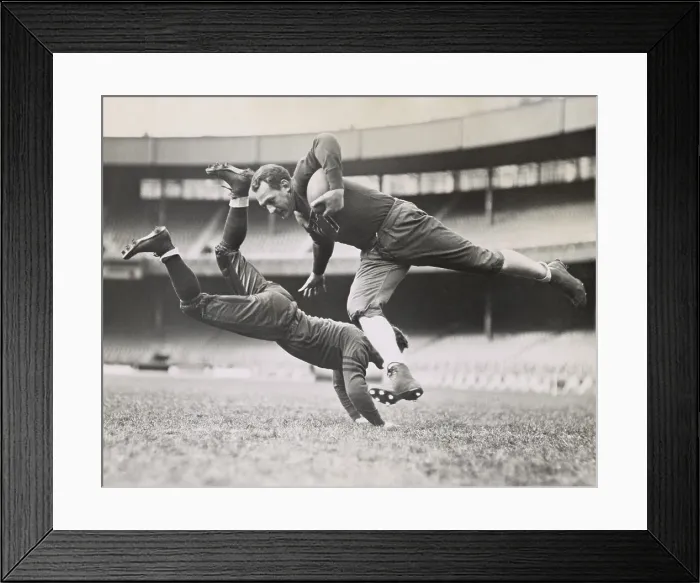 Framed Print : Chicago Bears teammates practicing as Joe Zeller tries to tackle Red Grange. March 18, 1935. - (BSLOC_2015_1_113)