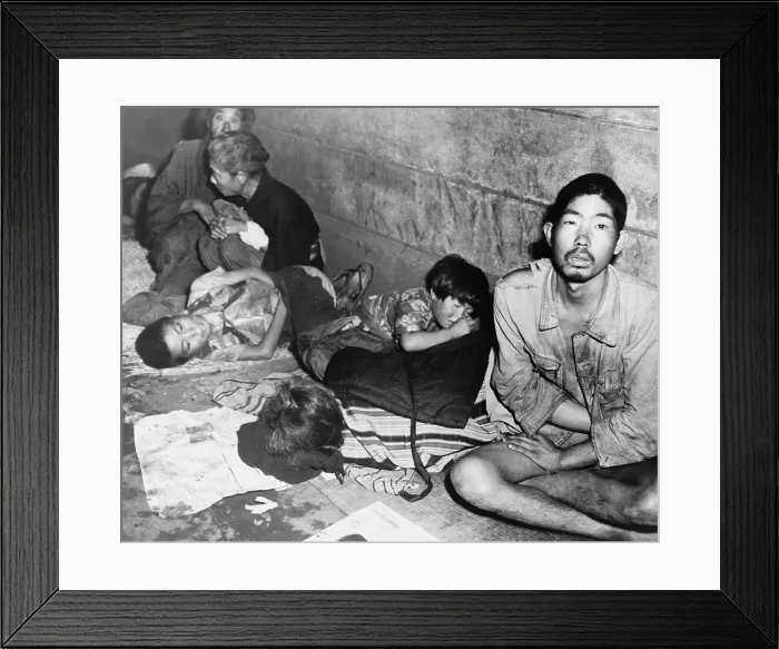 Framed Print : In Tokyo, months after Japan's World War II surrender, homeless Japanese families huddled in subway stations to sleep. October 20, 1945