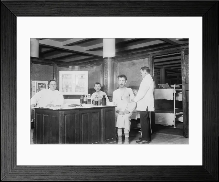 Framed Print : Two recently bathed men are given vaccinations by the doctor at New York City's Municipal Lodging House. Ca. 1910 Framed Print : Two recently bathed men are given vaccinations by the doctor at New York City's Municipal Lodging House. Ca. 1910