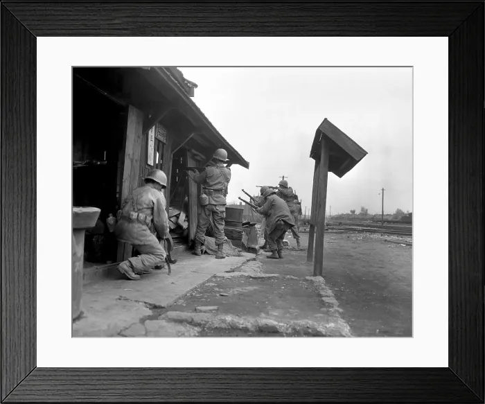 Framed Print : Soldiers of the 1st Cavalry Division fighting in a train yard in Pyongyang, Korea. They entered the North Korean city on Oct. 19 and secured it by Oct. 22, 1950 Framed Print : Soldiers of the 1st Cavalry Division fighting in a train yard in Pyongyang, Korea. They entered the North Korean city on Oct. 19 and secured it by Oct. 22, 1950
