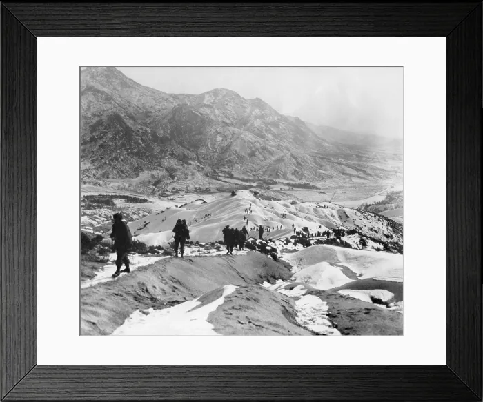 Framed Print : Soldiers of the U.S. 19th Infantry Regiment patrol in the snowy mountains about 10 miles north of Seoul, Korea. They are looking for the enemy lines and positions