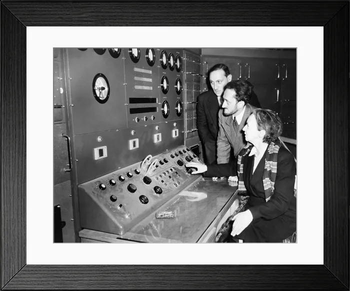 Framed Print : Atomic scientist Irene Curie (1897 -1956), operating the controls of France's first nuclear reactor at Chatillon, a Parisian suburb in 1948