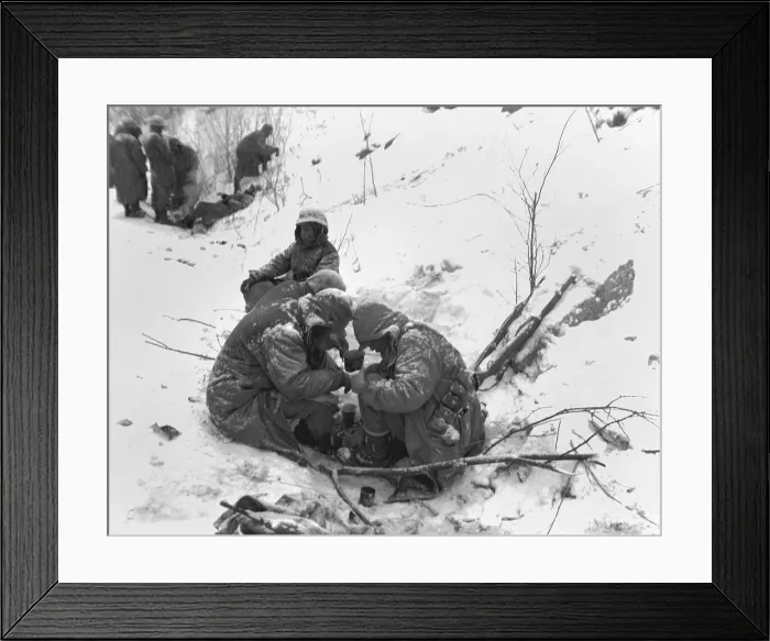 Framed Print : Marines exhausted from their five days and nights of battle with Chinese take a rest with a warm beverage