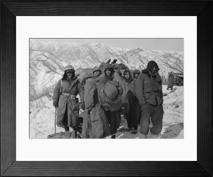 Framed Print : Frostbite casualties of U.S. Marines await air evacuation from the Chosin Reservoir Framed Print : Frostbite casualties of U.S. Marines await air evacuation from the Chosin Reservoir