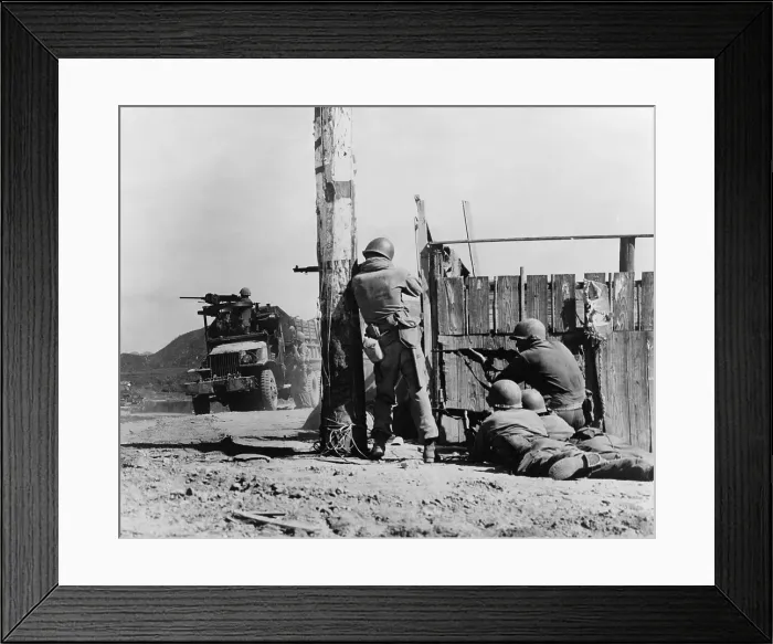 Framed Print : U.S. Combat Engineers return North Korean sniper fire after the Battle of Yongdong, July 31, 1950. Korean War, 1950-53. (BSLOC_2014_11_9)