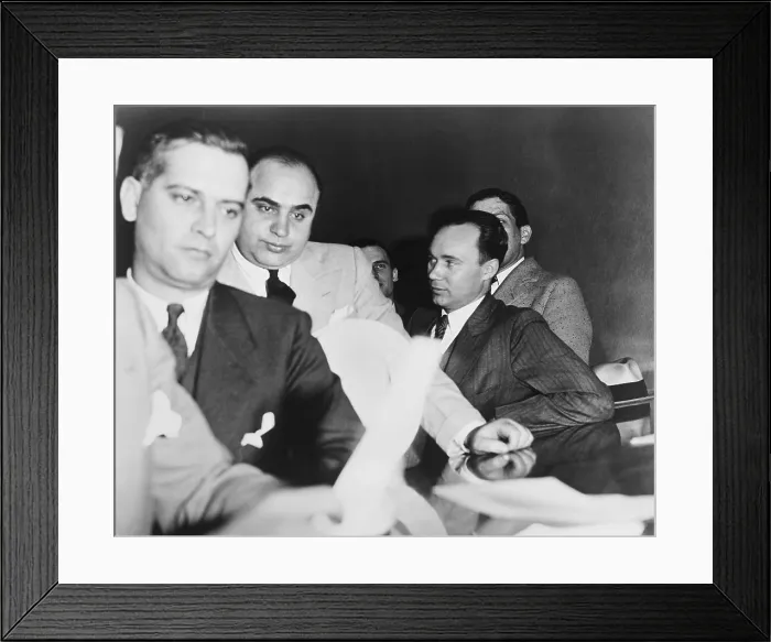 Framed Print : Al Capone, at the time of his indictment for tax evasion, June 5, 1931. At right is one of Capone's attorneys, Michael Ahern. - (BSLOC_2015_1_12)