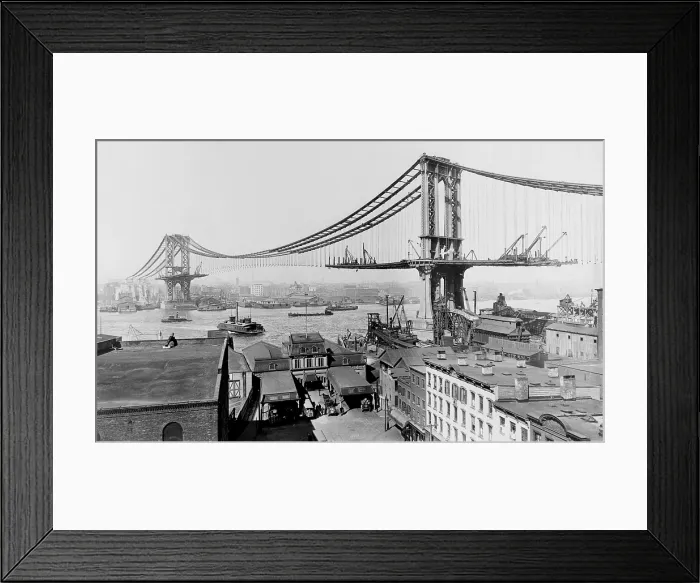 Framed Print : Manhattan Bridge under construction in 1909. The bridge spanned the east River from Manhattan's Canal Street to Flatbush Avenue in Brooklyn Framed Print : Manhattan Bridge under construction in 1909. The bridge spanned the east River from Manhattan's Canal Street to Flatbush Avenue in Brooklyn