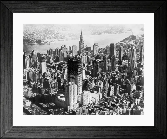Framed Print : Aerial view of mid-town Manhattan during construction of Rockefeller Center. In center background is the Chrysler building. 1932 Framed Print : Aerial view of mid-town Manhattan during construction of Rockefeller Center. In center background is the Chrysler building. 1932