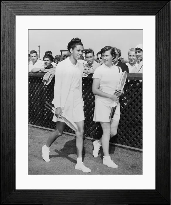 Framed Print : Althea Gibson and Barbara Knapp walk on grass at Forest Hills in 1950. Gibson won 10 straight championships in 1947 in the segregated ATA (American Tennis Association)