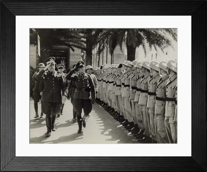 Framed Print : Gen. Italo Gariboldi (left), Italian governor of Libya, reviewing troops with Erwin Rommel. Rommel commanded German Afrika Korps during World War 2. Ca. 1941. (BSLOC_2013-12_122) Framed Print : Gen. Italo Gariboldi (left), Italian governor of Libya, reviewing troops with Erwin Rommel. Rommel commanded German Afrika Korps during World War 2. Ca. 1941. (BSLOC_2013-12_122)
