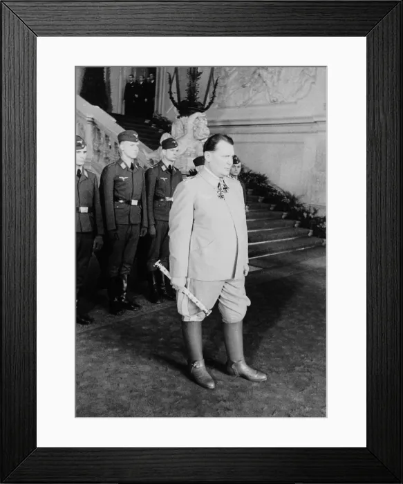 Framed Print : Hermann Goering at Castle Belvedere in Vienna, with German Luftwaffe personnel in background. The occasion was a state visit of Romanian leader General Antonescu, a German ally
