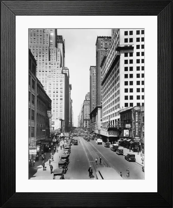 Framed Print : New York City's 42nd Street and Lexington Avenue, looking west. 1928-29. Chrysler Building on near right, with the Commodore Hotel behind it