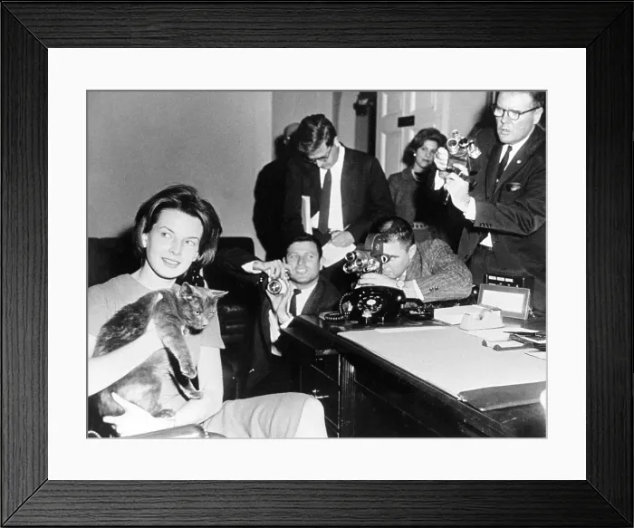 Framed Print : First Lady's Press Secretary Pamela Turnure holds Caroline Kennedy's cat, Tom Kitten Framed Print : First Lady's Press Secretary Pamela Turnure holds Caroline Kennedy's cat, Tom Kitten