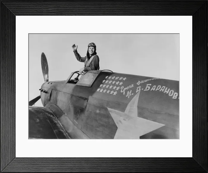 Framed Print : Hero of the Soviet Union, pilot Mikhial Baranov on the Don River front, 1942. His plane displays 24 stars for his victories against the Germans. He died on Jan