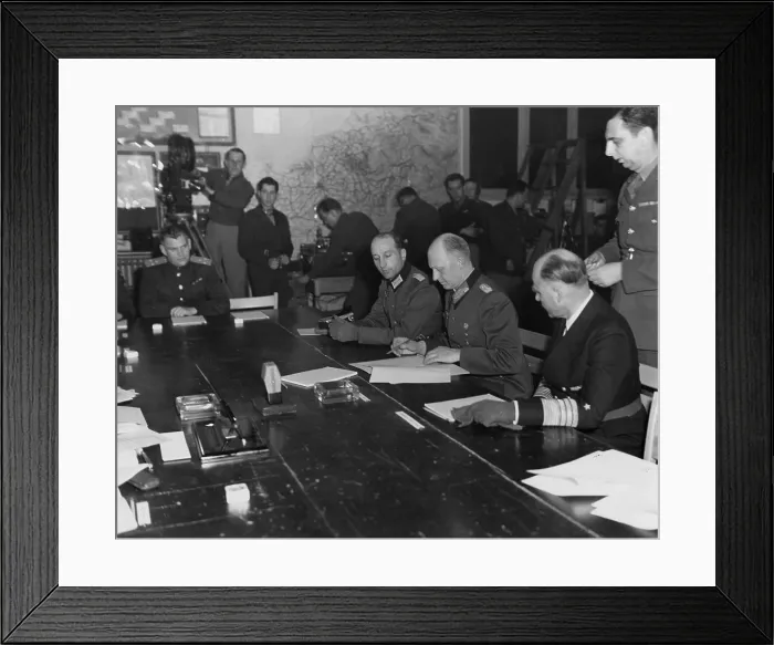 Framed Print : German General Gustaf Jodl, signs the unconditional surrender document. At Jodl's left is German Admiral Von Friedeburg; at right is German Major Wilhelm Oxenius Framed Print : German General Gustaf Jodl, signs the unconditional surrender document. At Jodl's left is German Admiral Von Friedeburg; at right is German Major Wilhelm Oxenius