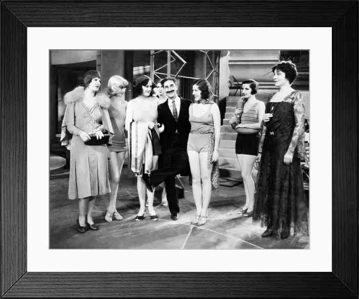 Framed Print : ANIMAL CRACKERS, Margaret Irving (left), Groucho Marx (raised leg), Margaret Dumont (right), 1930