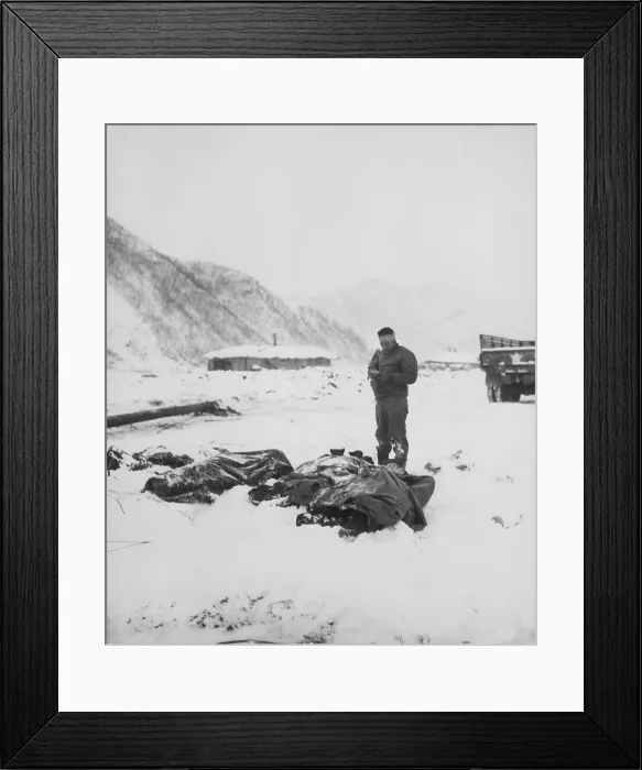 Framed Print : A wounded chaplain reads a memorial service over the snow-covered bodies of dead Marines. At Kotori, Korea, south of the Chosin reservoir where U.S Framed Print : A wounded chaplain reads a memorial service over the snow-covered bodies of dead Marines. At Kotori, Korea, south of the Chosin reservoir where U.S