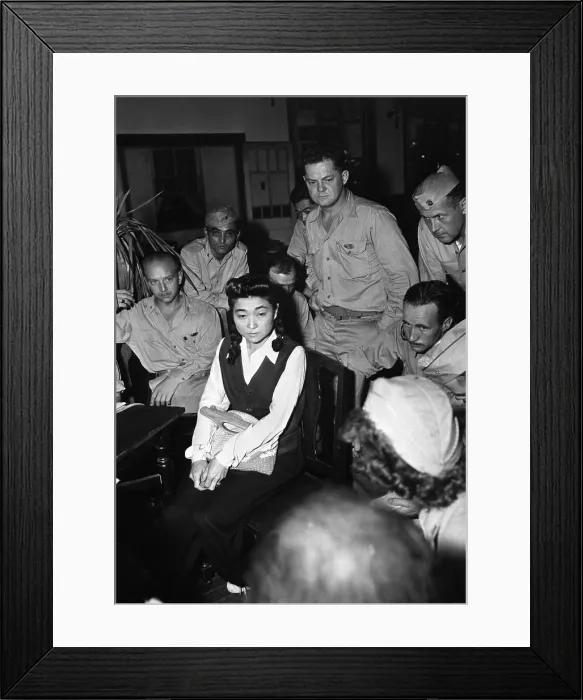 Framed Print : Iva Toguri, was one of several English speaking, Tokyo Rose radio broadcasters. Photo shows her with U.S. Navy officers, being interviewed by newsmen in Sept. 1945 Framed Print : Iva Toguri, was one of several English speaking, Tokyo Rose radio broadcasters. Photo shows her with U.S. Navy officers, being interviewed by newsmen in Sept. 1945