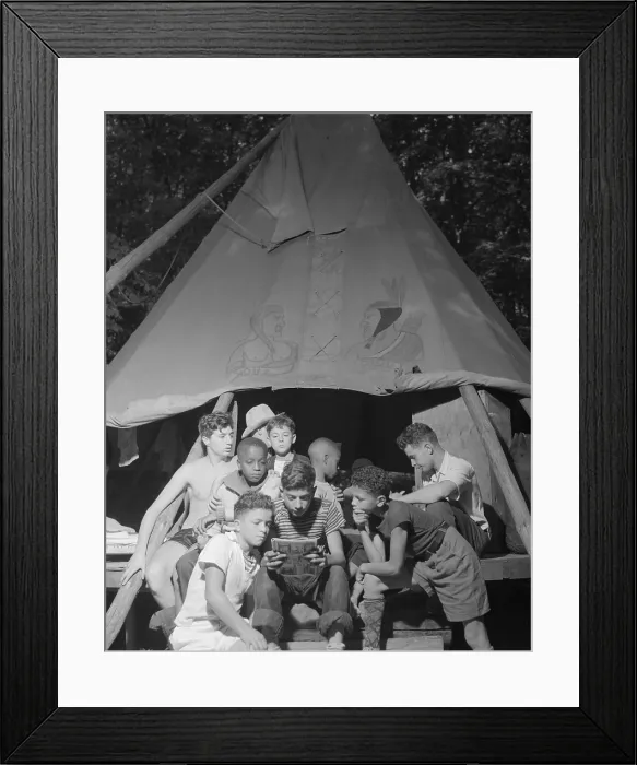 Framed Print : Racially integrated group of boys sharing a comic book at Camp Nathan Hale in Southfields, NY. The camp was supported by the Methodist Camp Service. Aug