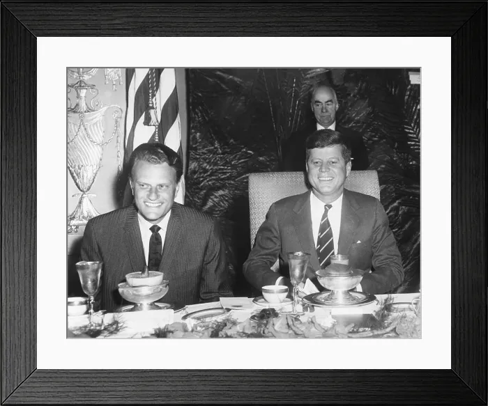 Framed Print : Reverend Billy Graham and President John Kennedy seated at a Prayer Breakfast. It was sponsored by the International Council for Christian Leadership. Feb.9, 1961